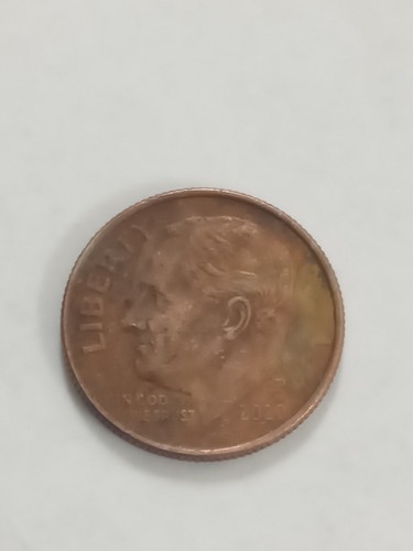 Brown dime from - dime, with